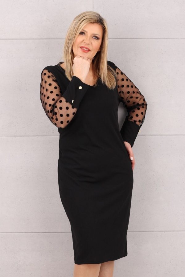 Kobieca sukienka w groszki czarna