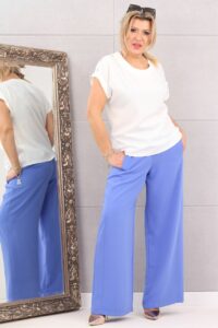 Zwiewna bluzka z guziczkami na ramionach biała