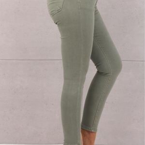 Spodnie damskie jeansy rurki zielone