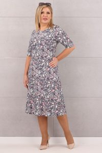 Wzorzysta rozkloszowana kolorowa sukienka w kwiatki