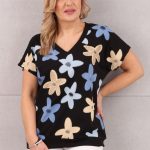 Czarna bluzka damska ze ściągaczem na dole