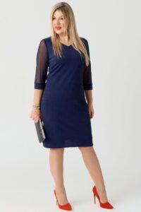 Elegancka błyszcząca sukienka plus size – wizytowa moda dla kobiet