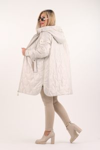 perłowa kurtka z zamkami po bokach