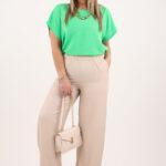 Beżowe eleganckie spodnie damskie z szerokimi nogawkami