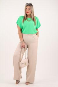 Beżowe eleganckie spodnie damskie z szerokimi nogawkami