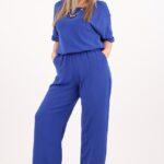 Chabrowy kombinezon na wesele z szerokimi nogawkami