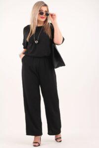 Czarny kombinezon na wesele z szerokimi nogawkami