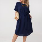 Luźna sukienka wiązana w talii granatowa