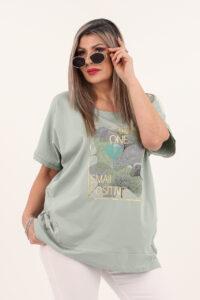 zielona bluzka z ażurowymi wstawkami