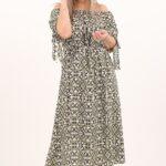 Zielona letnia sukienka z wiązaniem na rękawach