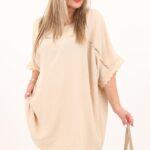 beżowa bluzka z koronkowym rękawem