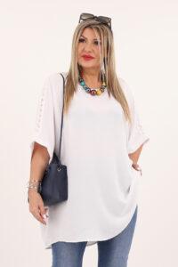 biała bluzka z ażurowymi rękawami