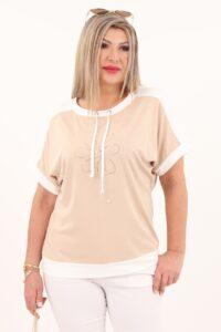 Bluzka ze sznurkami na dekolcie z kwiatem