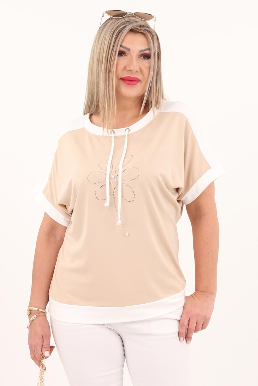 Bluzka ze sznurkami na dekolcie z kwiatem