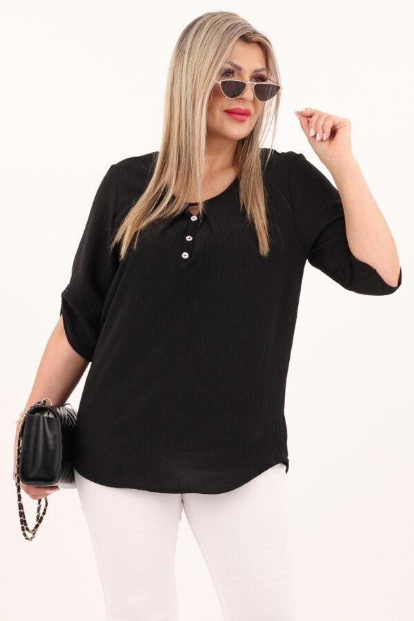 Czarna bluzka z guziczkami na dekolcie