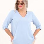 Niebieska elegancka bluzka z dekoltem w serek