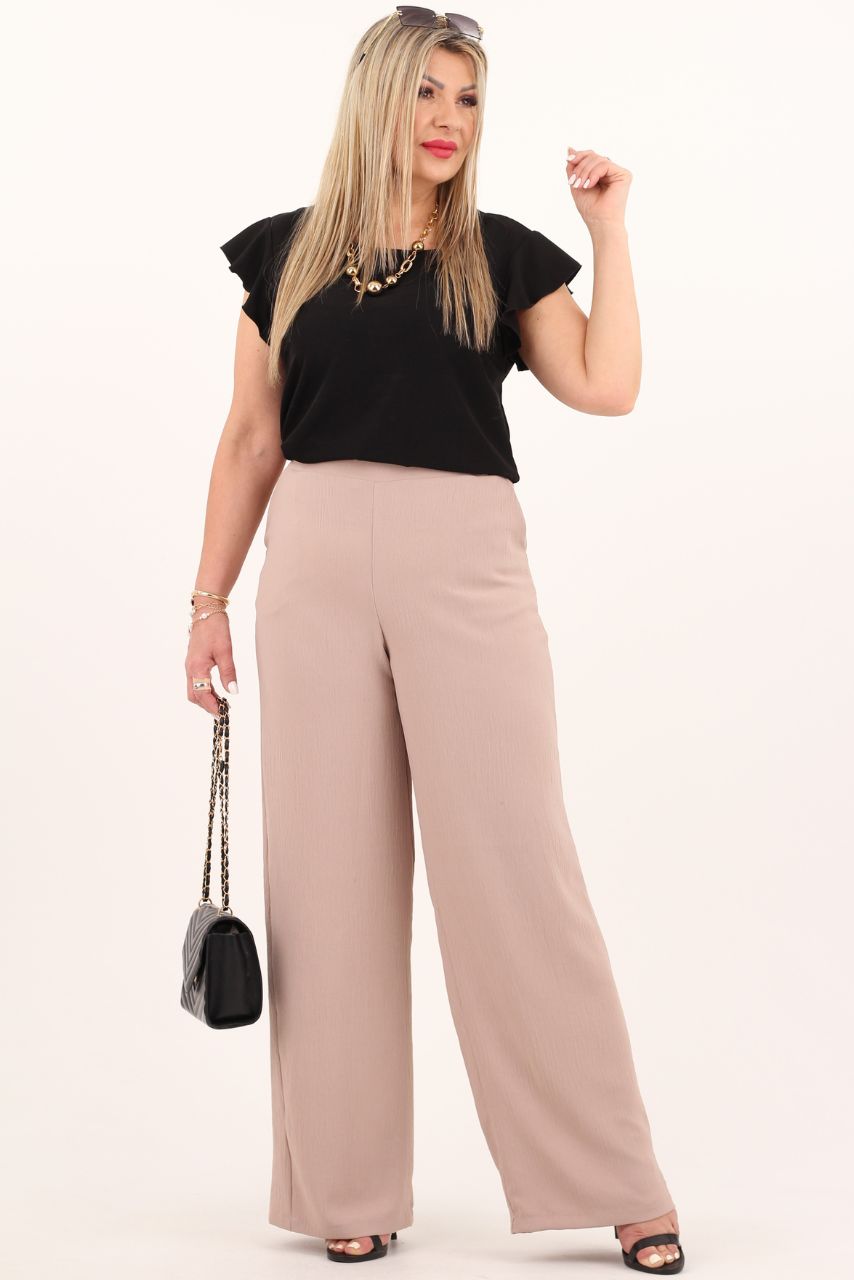 Beżowe spodnie damskie z szeroką nogawką