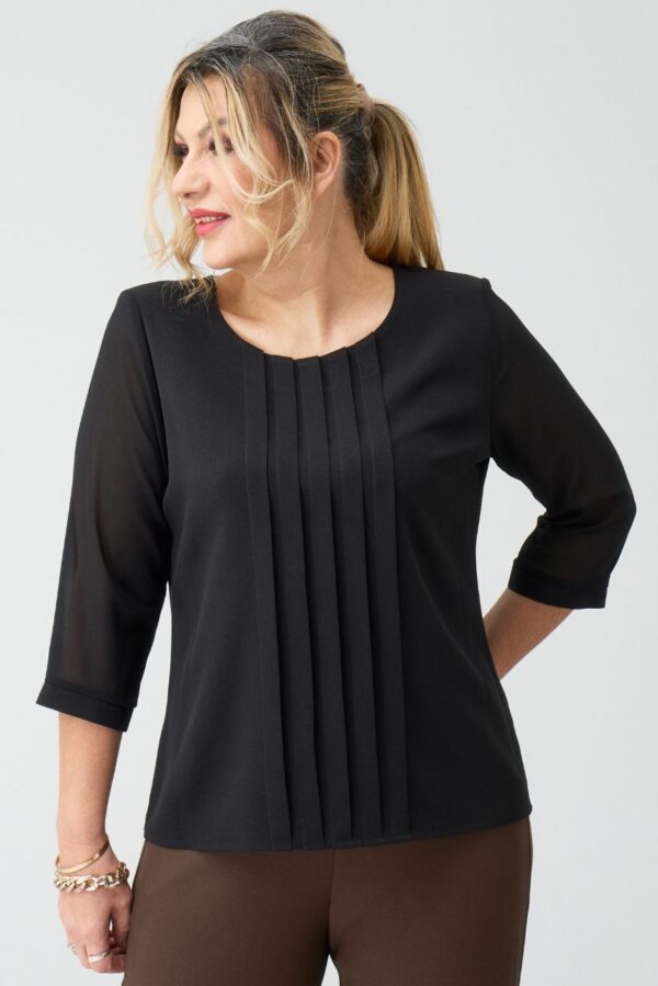 Czarna bluzka damska XXL – wizytowa moda dla puszystych kobiet