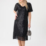 Błyszcząca elegancka sukienka z cekinami plus size czarna midi 44-52