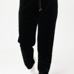 Czarne dresy damskie plus size – spodnie dla puszystych kobiet