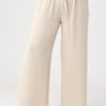 Letnie-spodnie-damskie-duże-rozmiary-z-szerokimi-nogawkami-beżowe (1)