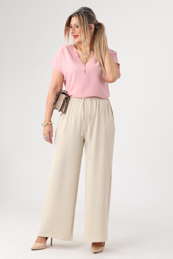 Letnie spodnie damskie duże rozmiary z szerokimi nogawkami beżowe 42-48