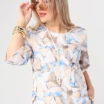 Modna bluzka dla puszystych styl wizytowy