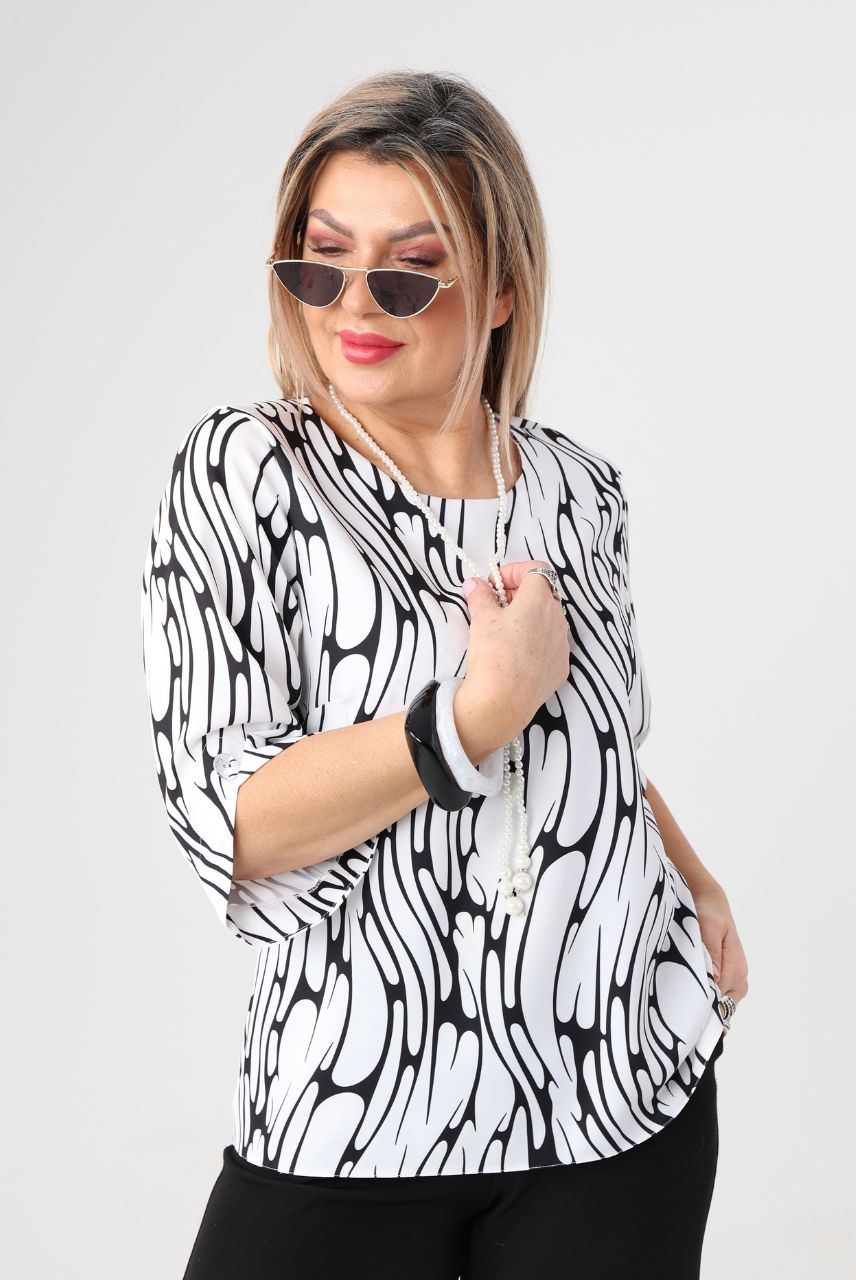 Modna bluzka dla puszystych styl wizytowy