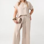 Beżowy elegancki komplet damski plus size bluzka i spodnie z rozcięciem po boku 44-52