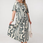 Zwiewna sukienka rozkloszowana PLUS SIZE zielona 44-52