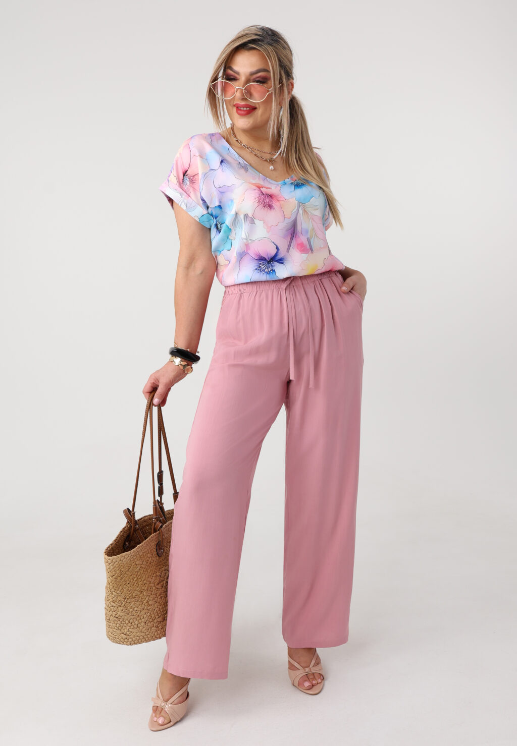 Cienkie spodnie damskie plus size na lato różowe 44-52