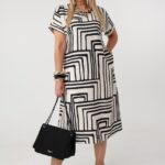 luzna-sukienka-plus-size-z-kieszeniami-kremowo-czarna (4)