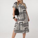 Luźna sukienka plus size z kieszeniami kremowo-czarna 42-50
